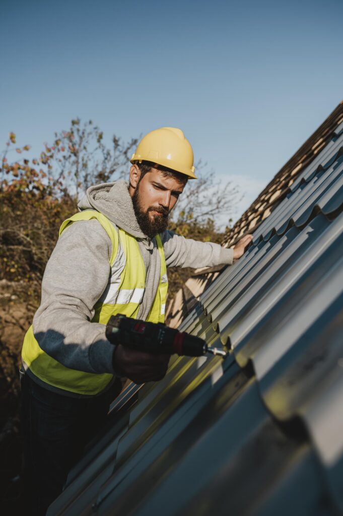 Man Repair Roof Tile With Drill